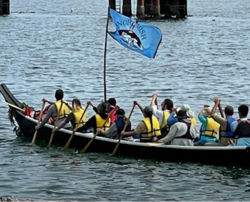 Canoe with wreath on bow